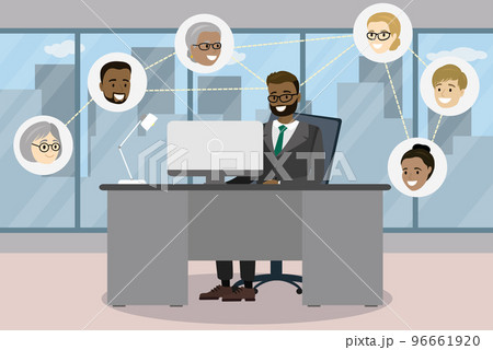 Businessman sitting at desk in modern office and communicating i Businessman sitting at desk in modern office and communicating i 96661920