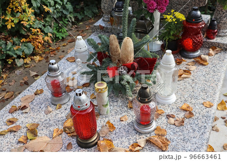 Lanterns on the tombstone in the public cemetery Lanterns on the tombstone in the public cemetery 96663461