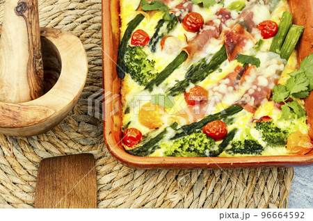 Casserole with asparagus and bacon in baking dish Casserole with asparagus and bacon in baking dish 96664592