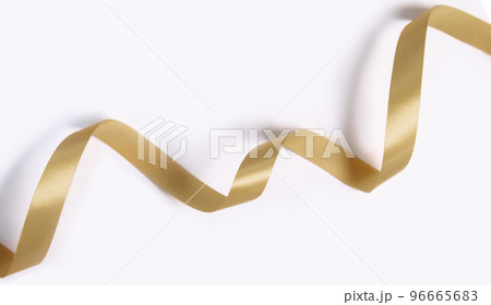 Golden riboon for decoration christmas, new year, anniversary, card, poster or birthday white background. 96665683