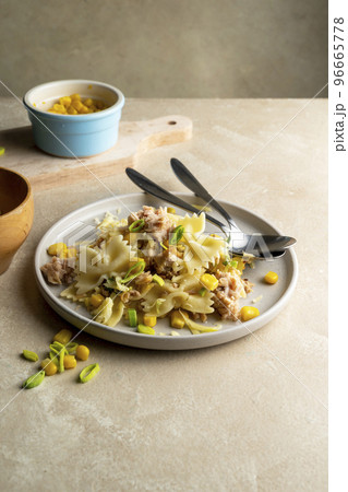 Tuna Pasta Bake with sweet corn. One pan easy, comfort food, warm lifestyle background. Tuna Pasta Bake with sweet corn. One pan easy, comfort food, warm lifestyle background. 96665778