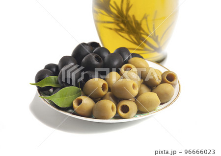 Jug with olive oil, green and black olives isolated on white background 96666023