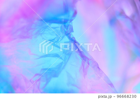 Transparent holographic wrinkled polyethylene background. Holographic colorful plastic film in blue, purple and pink tones with copy space. High quality photo Transparent holographic wrinkled polyethylene background. Holographic colorful plastic film in blue, purple and pink tones with copy space. High quality photo 96668230
