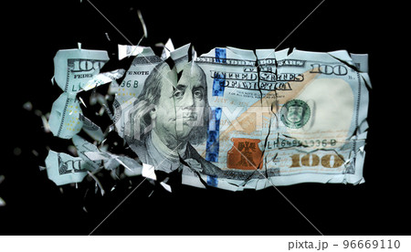 Broken US paper money on a black background Broken US paper money on a black background 96669110