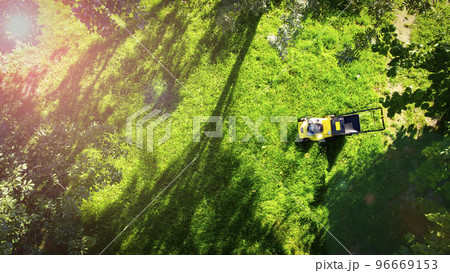 yellow lawn mower view from the top 96669153