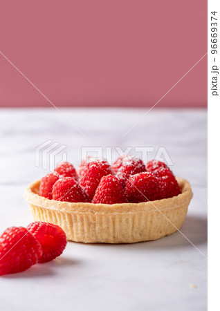 Tart with fresh raspberries Tart with fresh raspberries 96669374