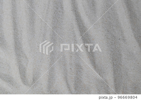 The background is made of fine clean sand with space for text. Banner, advertisement, poster. The background is made of fine clean sand with space for text. Banner, advertisement, poster. 96669804