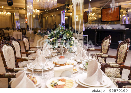 good served table in a restaurant good served table in a restaurant 96670169