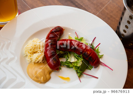 Juicy grilled sausages 96676913