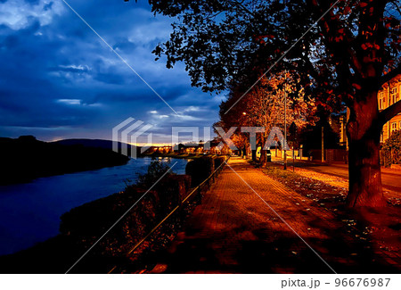 Golden autumn on the embankment at night in the light of lanterns Golden autumn on the embankment at night in the light of lanterns 96676987