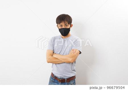 Asian man wearing Face Mask protect spread Covid-19 Coronavirus on white background Asian man wearing Face Mask protect spread Covid-19 Coronavirus on white background 96679504