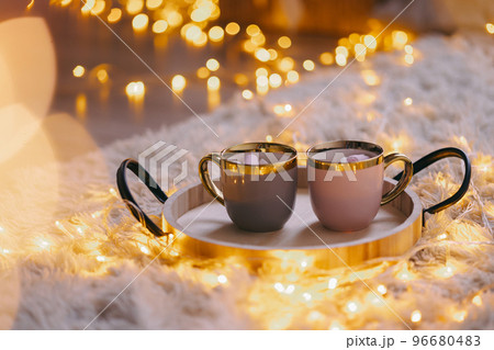 Two ceramic cups with hot chocolate Two ceramic cups with hot chocolate 96680483