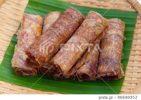 Sun dried banana roll snacks Sun dried banana roll snacks 96680952