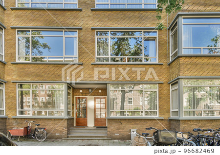 View of street near building with beauty of vegetation outside 96682469