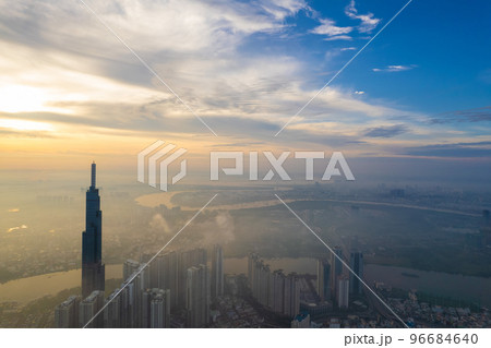 aerial view of Ho Chi Minh City in the morning, Top view aerial photo from flying drone of a Ho Chi Minh City with development buildings, transportation, energy power infrastructure. 96684640