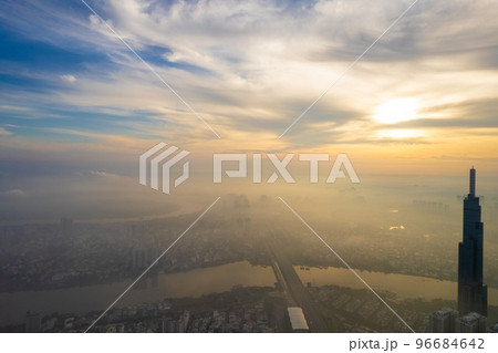 aerial view of Ho Chi Minh City in the morning, Top view aerial photo from flying drone of a Ho Chi Minh City with development buildings, transportation, energy power infrastructure. 96684642