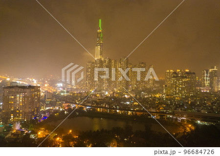 aerial view of Ho Chi Minh City in the morning, Top view aerial photo from flying drone of a Ho Chi Minh City with development buildings, transportation, energy power infrastructure. 96684726