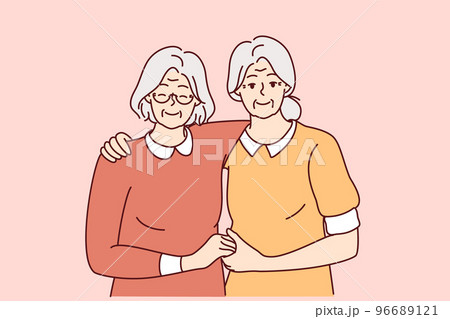 Smiling mature women hugging  96689121