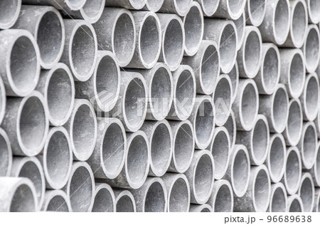 Closeup of asbestos pipes on construction site. 96689638