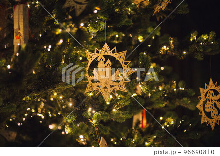Wooden Christmas decoration on tree Wooden Christmas decoration on tree 96690810