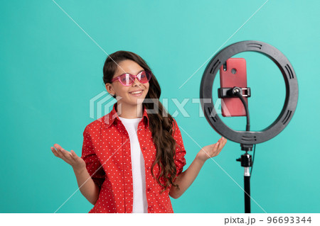happy teen girl long hair talking on camera video blog blogging online with selfie led, weblog. happy teen girl long hair talking on camera video blog blogging online with selfie led, weblog. 96693344