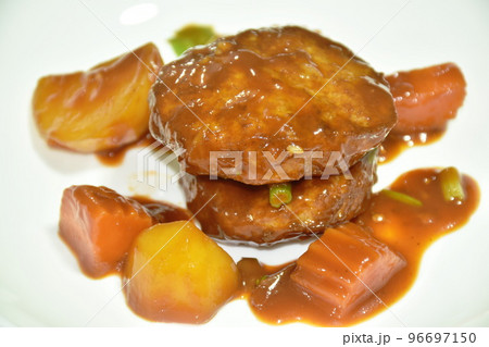 deep fried chop pork dressing potato and carrot with sweet gravy sauce on plate 96697150