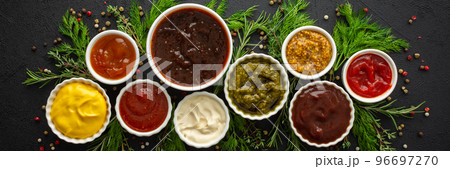 Sauces in bowls with seasonings 96697270