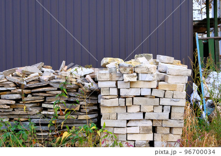Construction Materials. Building materials for construction of residential house. Pile of brickwork at construction site. Construction Materials. Building materials for construction of residential house. Pile of brickwork at construction site. 96700034