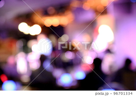 Blurred silhouette singer has fun singing to music in jazz club on big festival 96701334