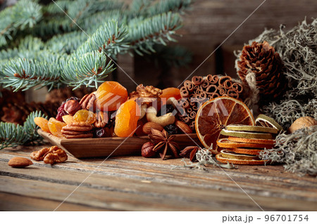 Christmas still-life with dried fruits and nuts. 96701754