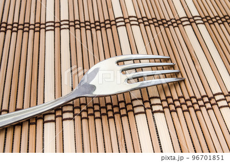 Close-up of a fork on the dining table. 96701851