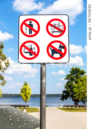 Prohibition signs on the city embankment Prohibition signs on the city embankment 96704646