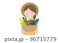 段ボールに入った夏野菜を持つ農家の女性 96715779