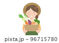 段ボールに入った冬野菜を持つ農家の女性  96715780