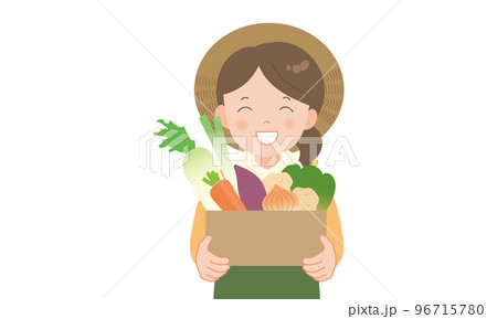 段ボールに入った冬野菜を持つ農家の女性  96715780
