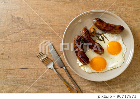 double fried egg with pork sausage 96717873