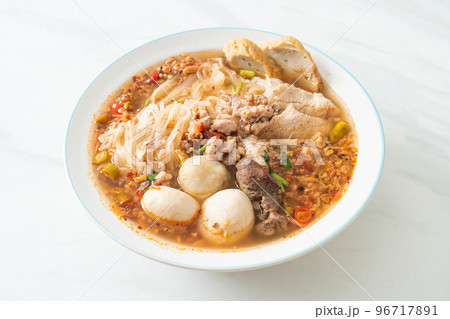 noodles with pork and meatballs in spicy soup noodles with pork and meatballs in spicy soup 96717891