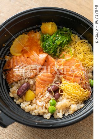 grilled salmon with brown rice donburi 96717949