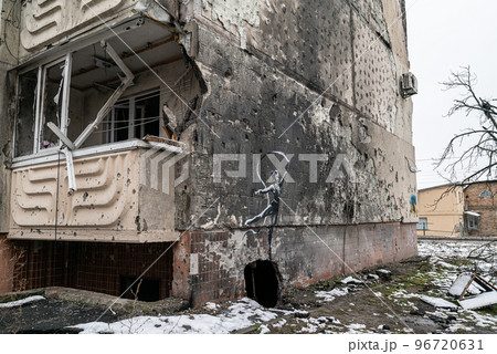 Graffiti by Banksy on a destroyed house in Irpin, Ukraine 96720631