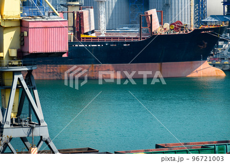 industrial infrastructure of seaport, sea, cranes and dry cargo ship, grain silo, bulk carrier vessel and grain storage elevators, concept of sea cargo transportation industrial infrastructure of seaport, sea, cranes and dry cargo ship, grain silo, bulk carrier vessel and grain storage elevators, concept of sea cargo transportation 96721003