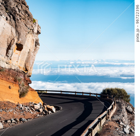 Curved road behind the layers of rocks Curved road behind the layers of rocks 96722396