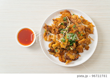 Crispy fried mussel pancake with egg Crispy fried mussel pancake with egg 96722781