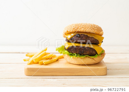 hamburger or beef burgers with cheese and french fries hamburger or beef burgers with cheese and french fries 96722791