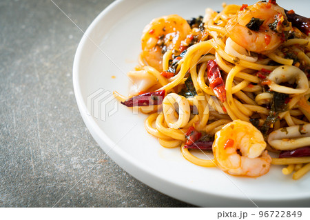 spicy spaghetti seafood on plate 96722849