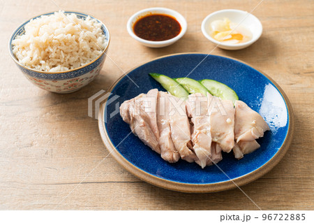 Hainanese chicken rice or rice steamed with chicken soup Hainanese chicken rice or rice steamed with chicken soup 96722885