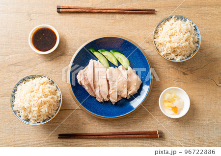 Hainanese chicken rice or rice steamed with chicken soup 96722886