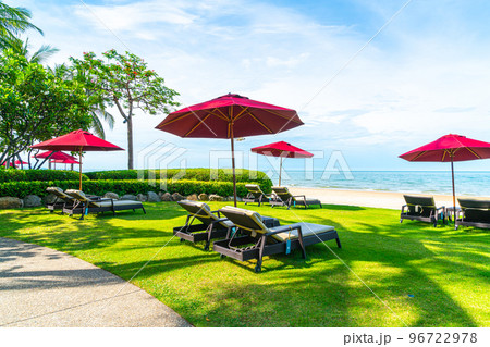 beach chair and umbrella with sea beach background beach chair and umbrella with sea beach background 96722978
