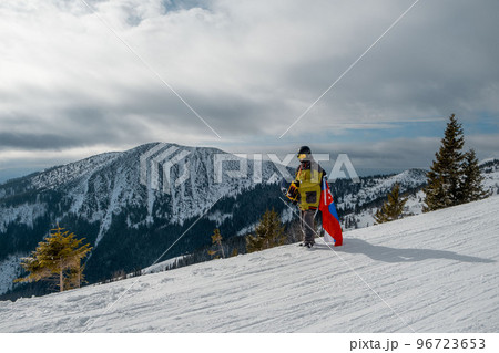 man snowboarder with slovakia flag at ski resort slope man snowboarder with slovakia flag at ski resort slope 96723653