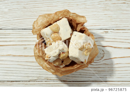 Concept of tasty food with nougat, close up Concept of tasty food with nougat, close up 96725875