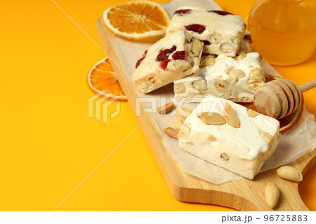 Concept of tasty food with nougat, space for text Concept of tasty food with nougat, space for text 96725883